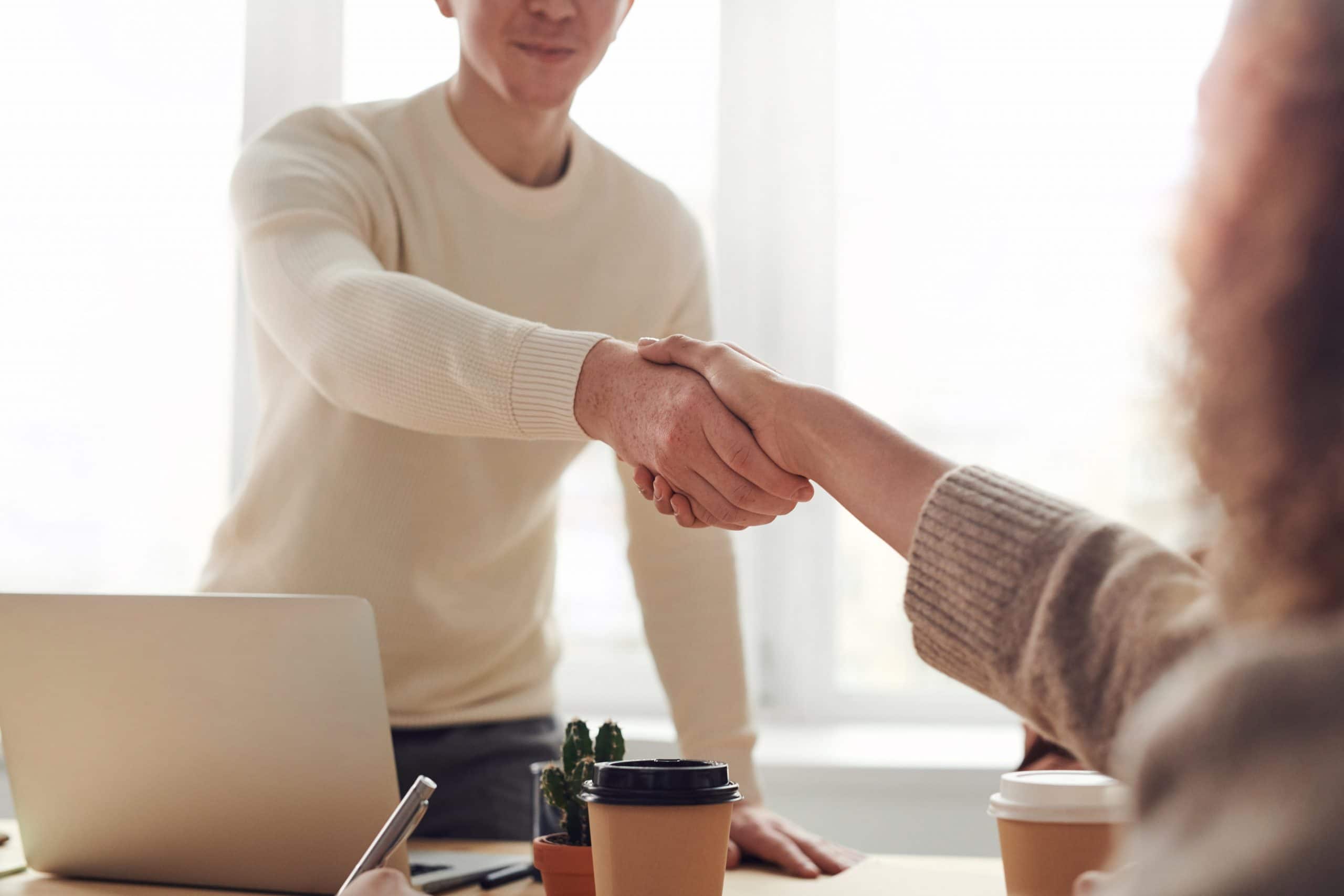 Picture of two people shaking hands