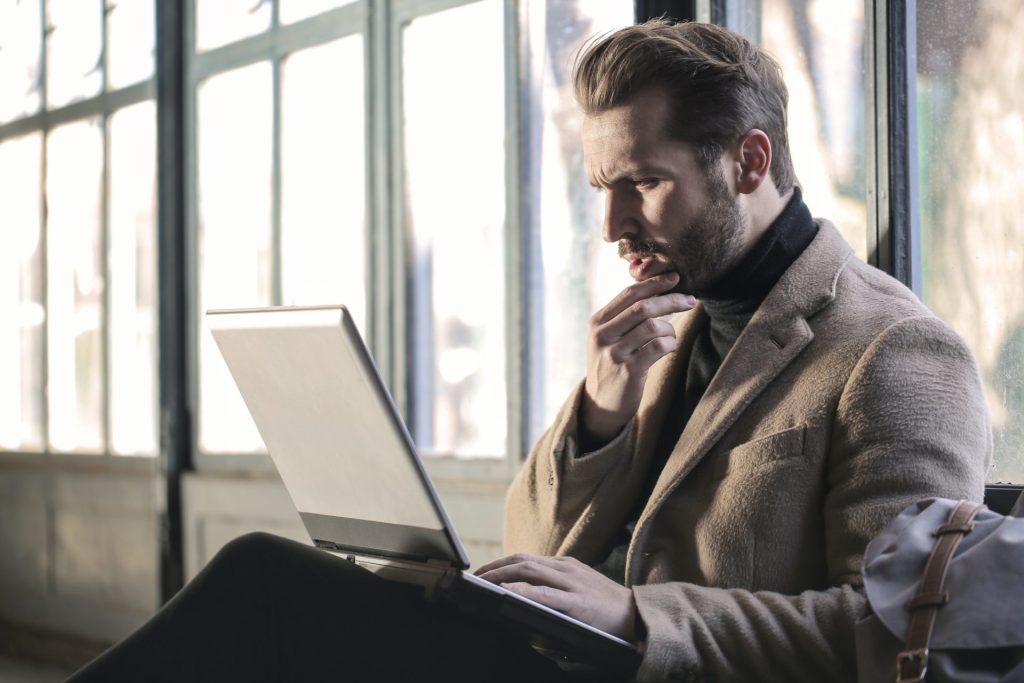 gdpr compliance consultant working on laptop