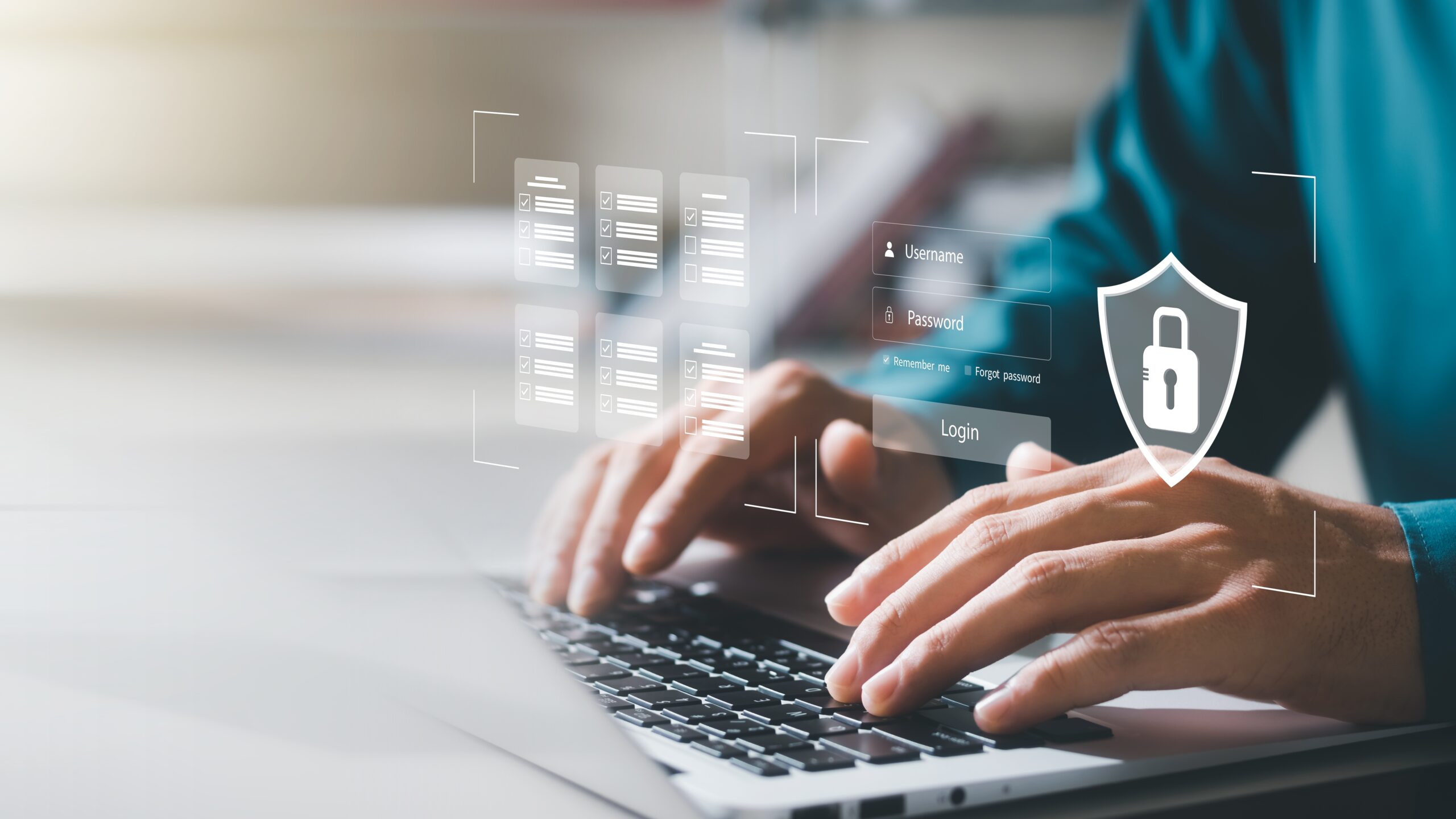 Professional typing on laptop working on an application's cybersecurity for its NIST 800-53 audit