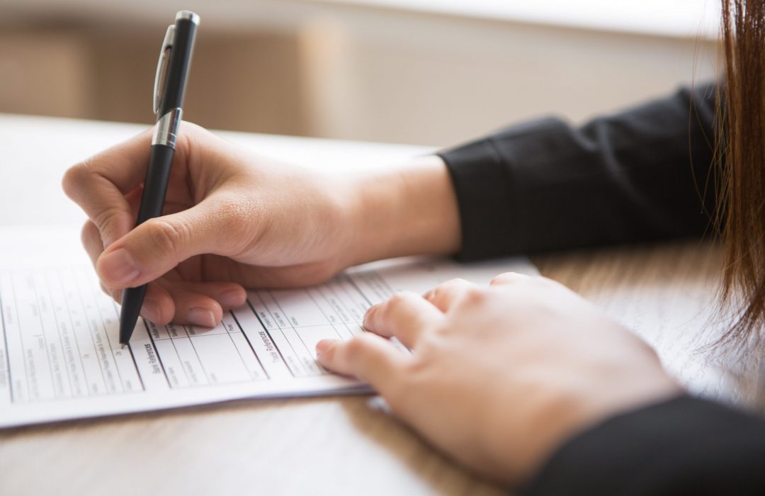 woman filling out form