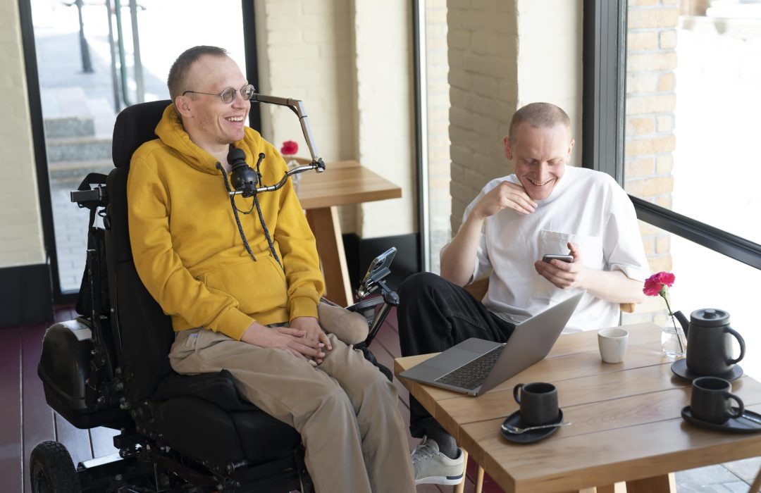 disabled person laptop disabled person using laptop with full accessibility