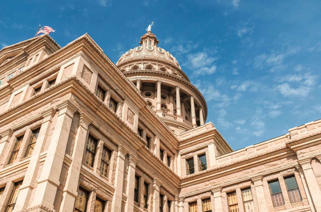 Texas state capitol building with blue sky