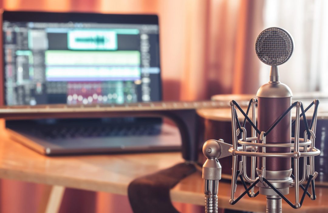 professional-microphone-blurred-background-sound-recording-concept-min professional-microphone-blurred-background-sound-recording-concept-min
